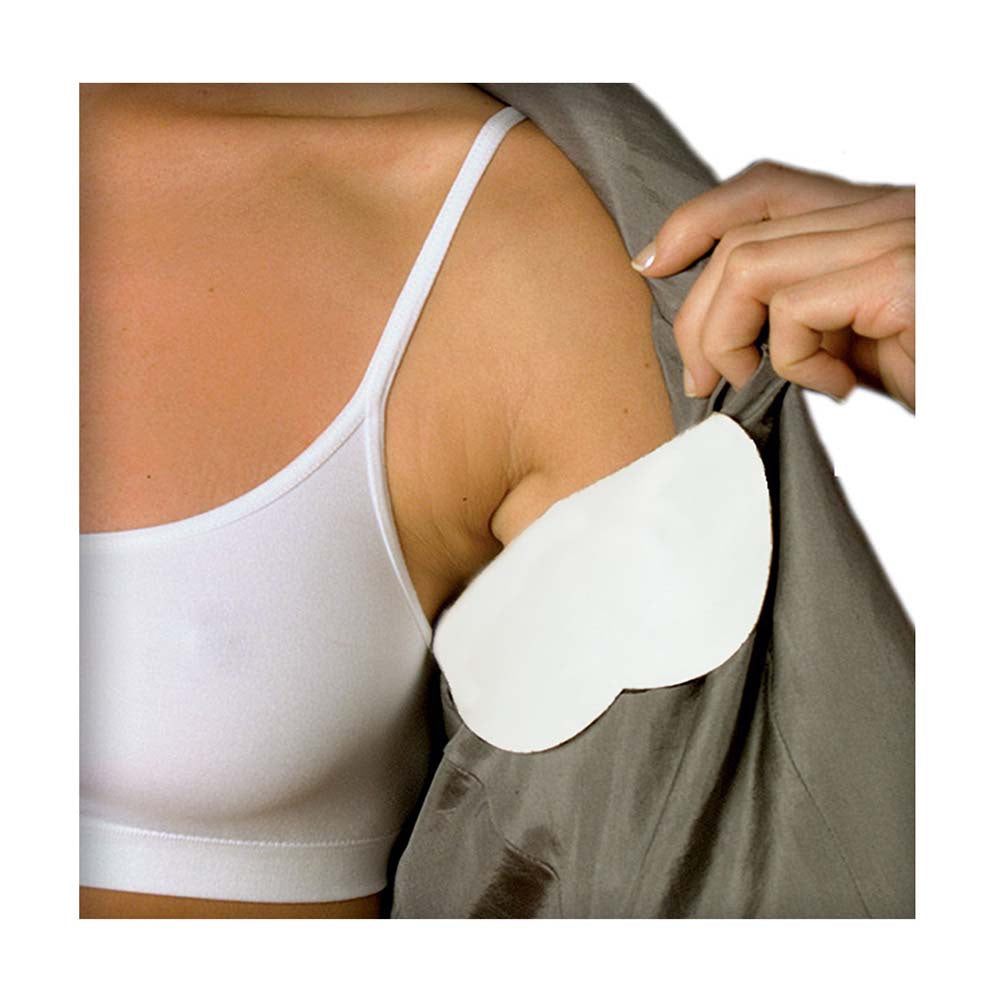 Clothing shield on shirt with image of women holding back her shirt to reveal clothing shield